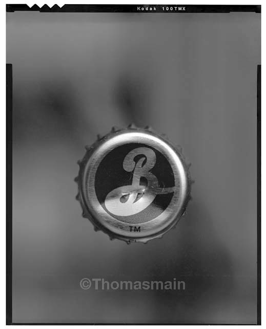 Floating Beer Caps Main Photography